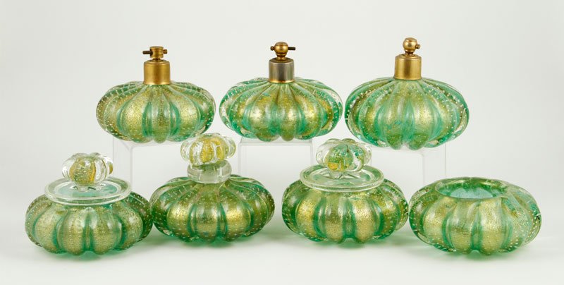 7 Cased Murano Glass Dresser Bottles: Grouping of seven cased Murano glass dresser bottles with applicazion di foglia d'oro and bolle (Buillicante) decoration, 4 1/2"h (tallest). Provenance: Collection of Robert Loy.