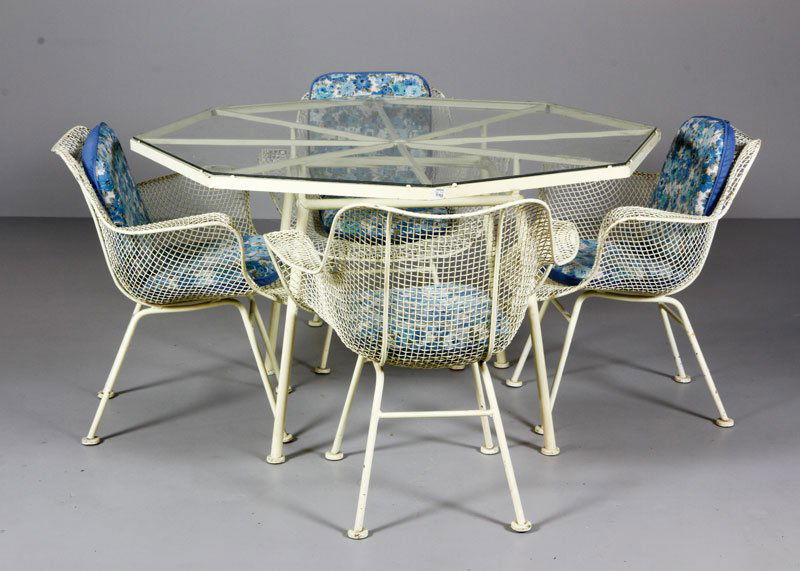 Russell Woodard "Sculptura" Patio Dinning Set: Russell Woodard "Sculptura" patio dinning set, enameled iron, including: four chairs (28 1/2" x 28" x 22") and octagon shaped dining table (29" x 51 1/2" x 48") with original glass top, circa 1950s. P
