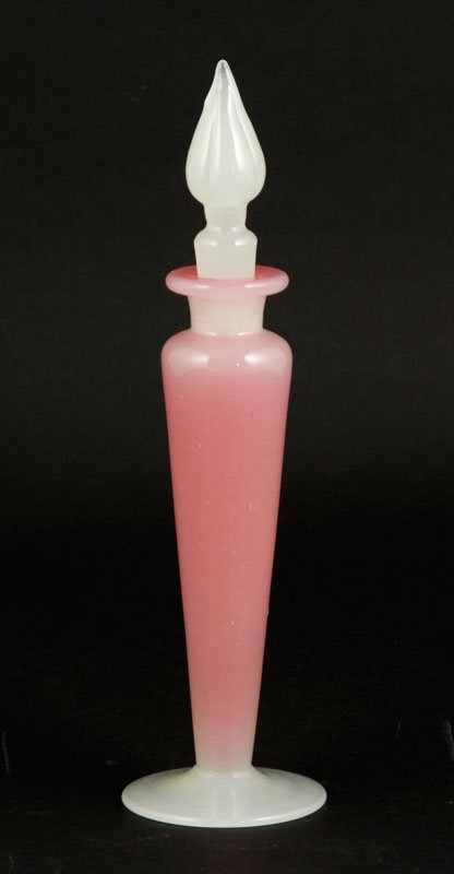 Steuben Rosaline and Alabaster Perfume: Steuben perfume with mis-matched flame stopper, rosaline and alabaster, partial original paper label, 5 7/8"h (not including stopper). Provenance: Collection of Robert Loy.