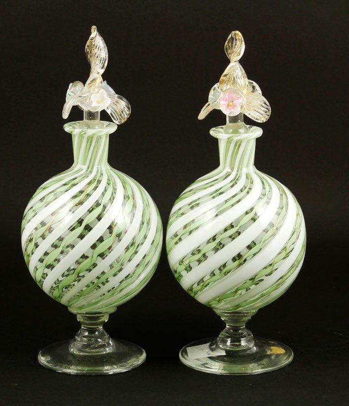 Pair Murano Perfumes: Pair of Murano glass perfumes with twisted ribbon decoration, floral stoppers and "Balboa" labels, 9 1/2"h. Provenance: Collection of Robert Loy.