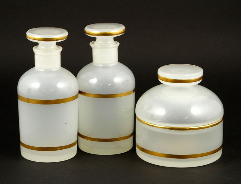3 Muranese Glass Vanity Bottles: Set of three Muranese opalina or camphor glass vanity bottles, original labels "Cenedese Glass Murano", also original Marshall Field Chicago label, 5 5/8"h (tallest). Provenance: Collection of Robert 