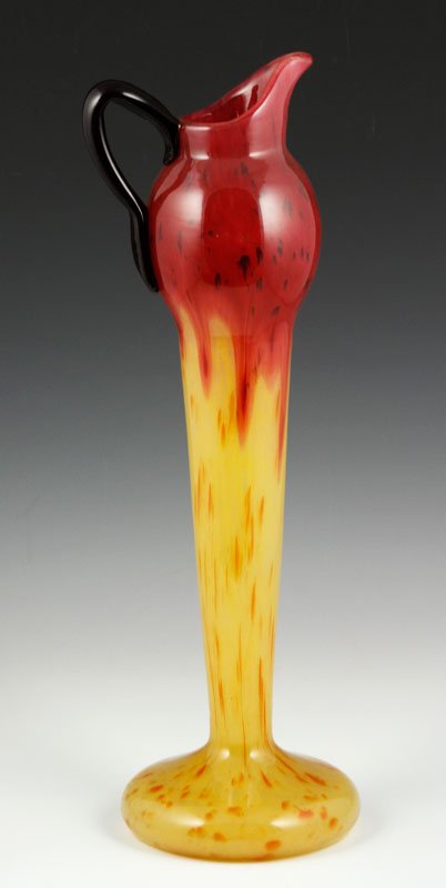 Schneider Glass Ewer: Charles Schneider glass ewer, c. 1920s, purple glass with applied handle using the tong technique, signed, 17” x 5 1/4”. Provenance: From a Atlanta, GA collection.
