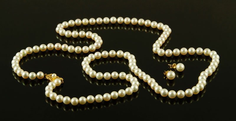 Mikimoto Pearl Necklace and Earrings: Mikimoto strand of pearls and earrings, 18K gold clasp with 6-6.5mm pearls on necklace, 14K gold on earrings with 7mm pearls. Provenance: Nashua, NH estate.