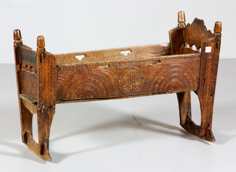 18th/19th C. Wooden Cradle: Late 18th/ early 19th century cradle, wooden with carved decoration, 23"h x 33"l x 13 1/2"d. Provenance: Fishers Island, NY estate.