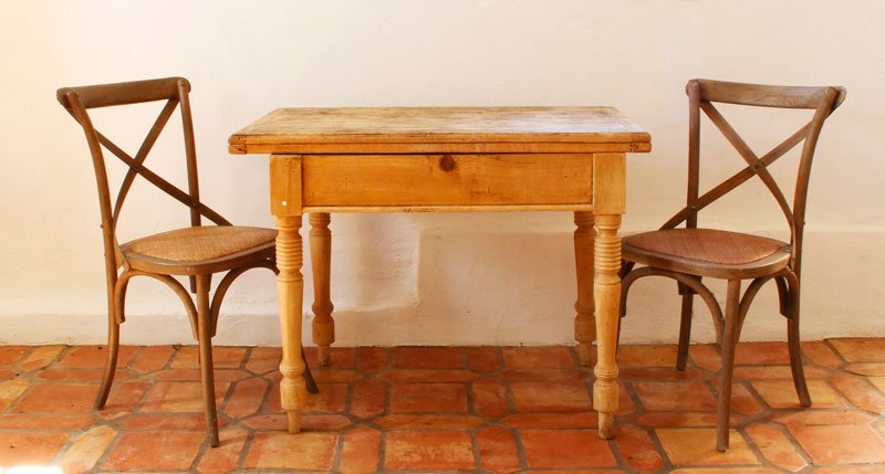 Antique Country Pine Baker's Table and Two Chairs: Antique country table, pine, with two Thonet style chairs, table 31" h x 40" w x 44" d. Property of Bob Greene.
