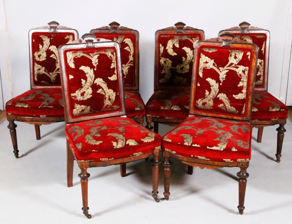 Lot of 6 Renaissance Revival Dining Chairs: Lot of six Renaissance revival dining chairs, upholstered, burnt wood and ebony accents, 38 3/4" h (back) x 18" h (seat). Provenance: from an Ipswich, MA collection.