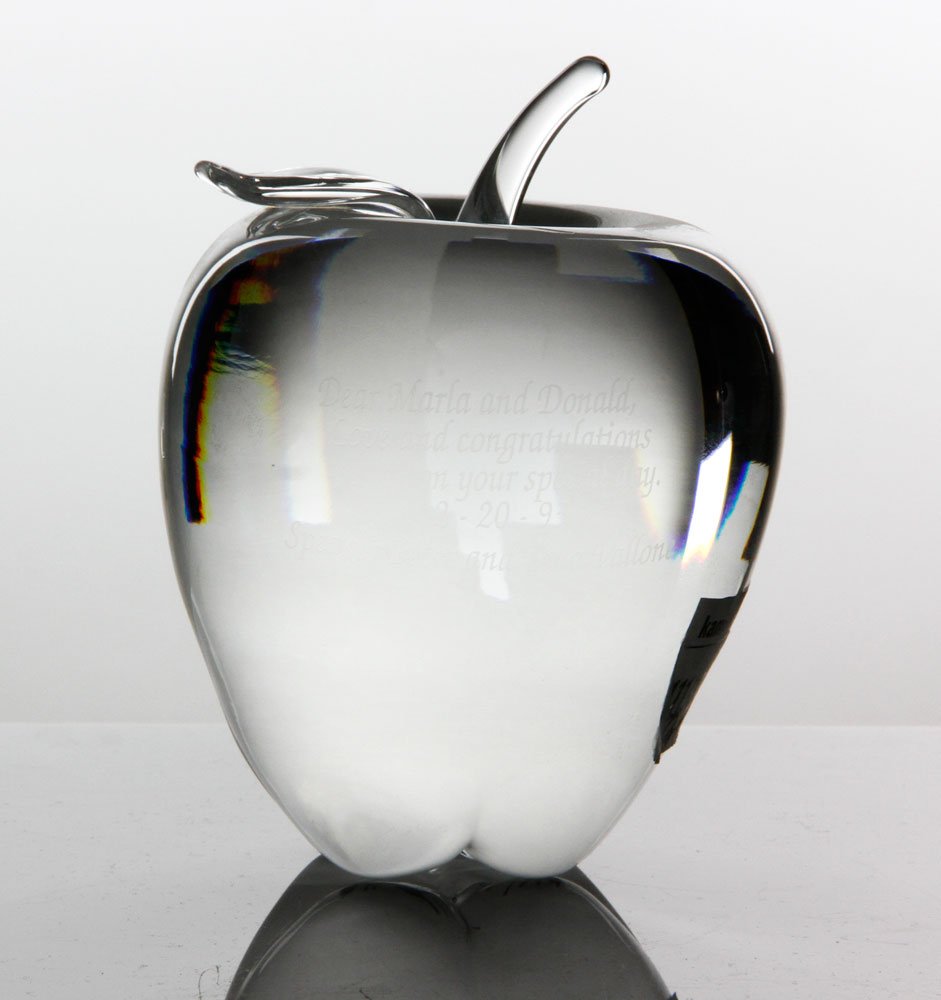 Etched and Inscribed Crystal "Big Apple": Crystal "Big Apple", etched and inscribed: "Dear Marla and Donald, love and congratulations on your special day, 12-20-93, speaker Peter and Tena Malone, 5" x 3 1/2". Provenance: Property of Marla Map
