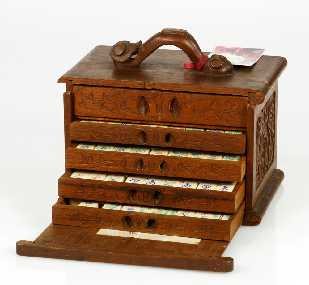 Antique Mah Jong Set: Antique mah jong set in carved box, bone or ivory and bamboo, 6 3/4"h x 10"w x 6 3/4"d. Provenance: Oak Bluffs, MA estate.