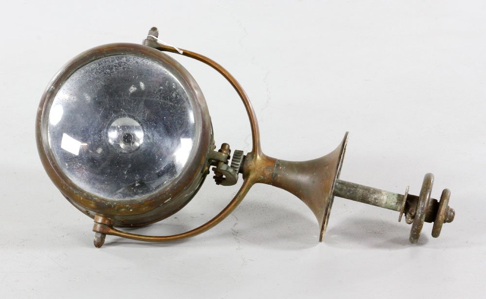 WWII Brass Searchlight: WWII brass search light, 26'' h x 10'' d. Provenance: Estate of Alexander Brook.