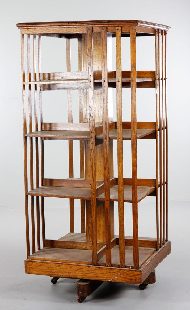 Arts and Crafts Bookcase: Oak Arts and Crafts revolving bookcase, 50'' h x 22 1/2 square. Provenance: Estate of Alexander Brook.