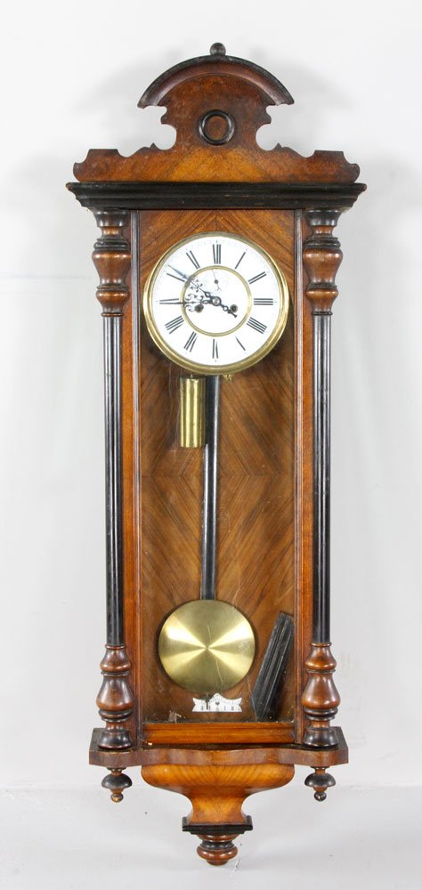 Vienna Regulator Clock: Vienna regulator clock with ornate crest, 48''. Provenance: Estate of Alexander Brook.