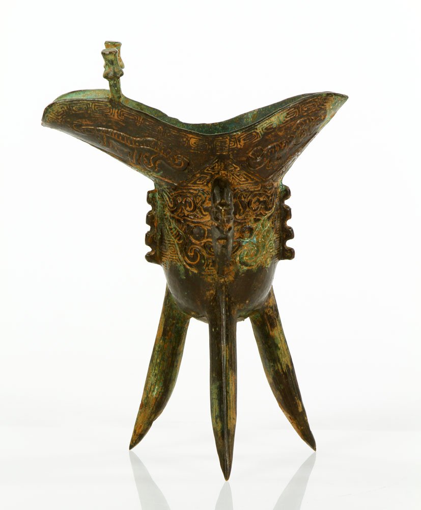 Chinese Bronze Wine Cup: Chinese wine cup, bronze, 20th century reproduction of Shang Dynasty form, 7 1/2" h. From a Acton, MA estate.