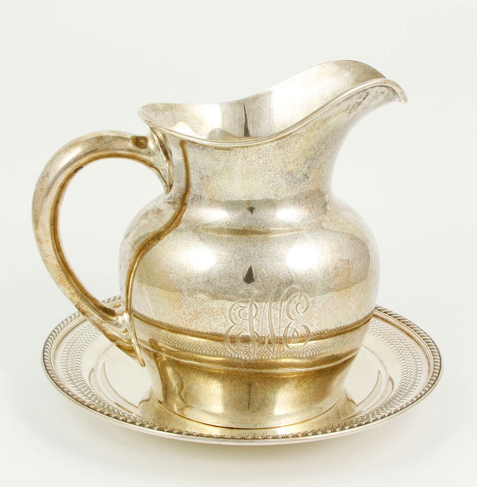 Sterling Gorham Water Pitcher and Dish: Sterling Gorham water pitcher and dish, 7 1/2" h, 16.6 troy oz pitcher, 5.7 troy oz dish.