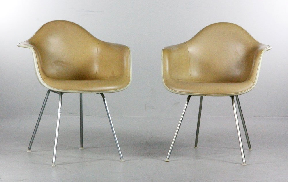 Pair Eames For Herman Miller Armchairs: Pair of Charles and Ray Eames for Herman Miller fiberglass Armchairs with beige vinyl shells.