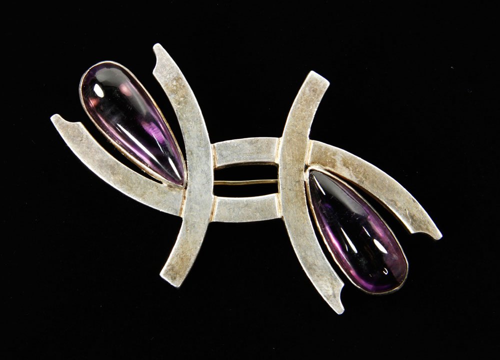 Pineda Amethyst and Sterling Brooch: Antonio Pineda amethyst and sterling silver brooch, set with two amethysts 1" x 1/2"each, signed with Pineda mark, and eagle quality mark, stamped 97C, circa 1950s, approximately 0.643 troy oz TW, 2 3