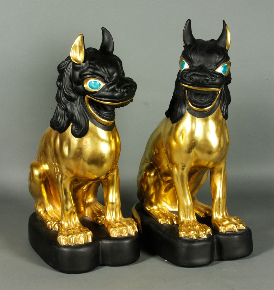 Pair of Porcelain Foo Dogs: Pair of Foo dogs, porcelain, Italian, circa 1980s, stamped "made in Italy" on underside of base, 17” x 6” x 11”. Provenance: From a Boyton Beach, FL estate.