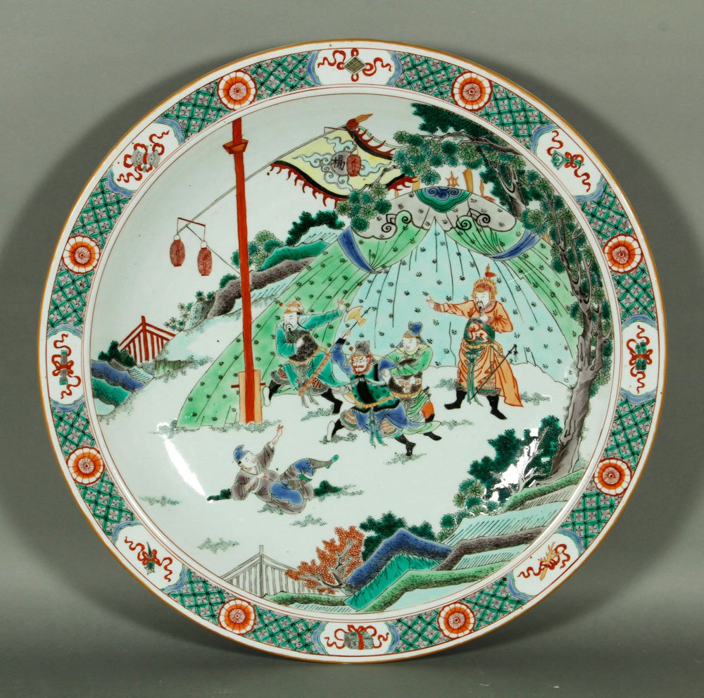 Chinese Famille Verte Plate: Famille verte plate, China, decorated with a war narrative, Kangxi mark on base, 20" dia.