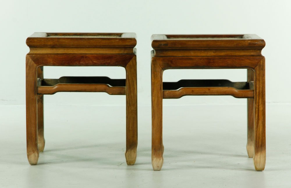 Chinese Pair of Huanghuali Stools: Pair of carved Huanghuali wood stools, China, 18 1/4" x 16" x 16".