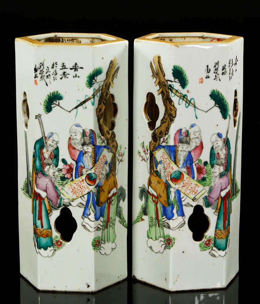 Chinese Famille Rose Hat Stand Vases: Pair of famille rose porcelain vases, China, hexagonal hat stand form decorated with a group of scholars viewing a painting, 11 1/2" h.