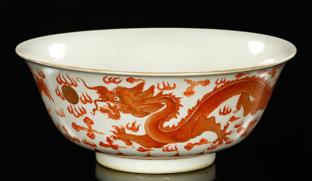 Chinese Famille Rose Porcelain Bowl: Famille rose porcelain bowl, China, decorated with flying dragons and waves, Guangxu mark, 10 3/4”.