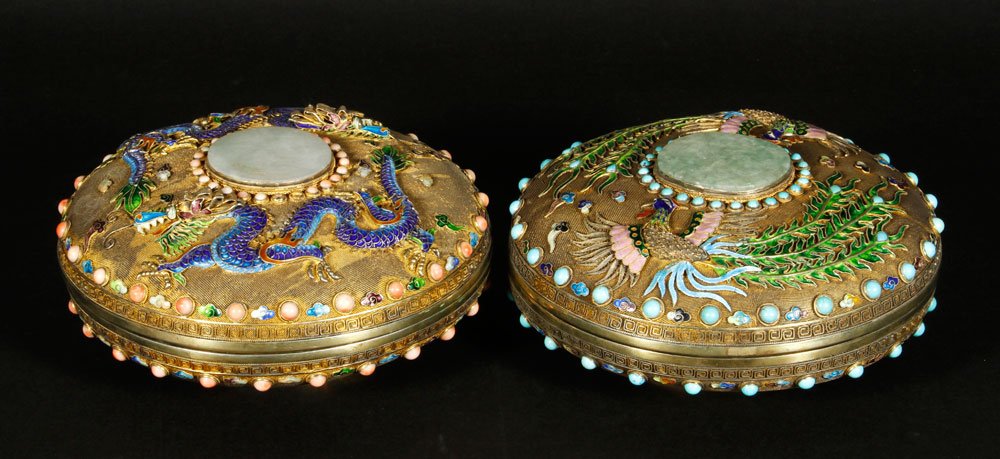 Fine Chinese Gilt Silver boxes: Pair of gilt silver boxes, enameled on carved sterling phoenix and dragons, with jade center medallion, turquoise and coral stones, mark on base, 3 1/2 '' h x 8'' d, 74.80 oz total weight.