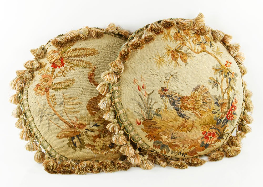19th C. Aubusson Tapestry Pillows: 19th century Aubusson tapestry pillows, with tassel edge and bird design, 16" dia. Provenance: From a Nashua, NH collection.