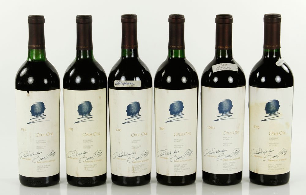 6 Bottles Various Vintages Opus One: Lot of six various vintages of Opus One, including 1981, 1982, 1983, 1985, 1990, and 1992, most at mid to high shoulder level. Provenance: From a Norwell, MA wine collection.