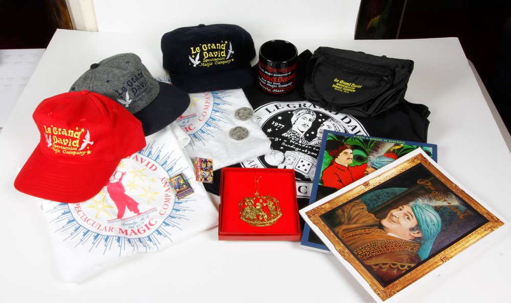 Cabot St Cinema Theatre and Le Grand David Souvenirs: Lot of souvenir items from the Cabot St Cinema Theatre and the Le Grand David Spectacular Magic Show, to include: 24K gold plated Christmas ornament; t-shirts, size medium and large; three baseball st