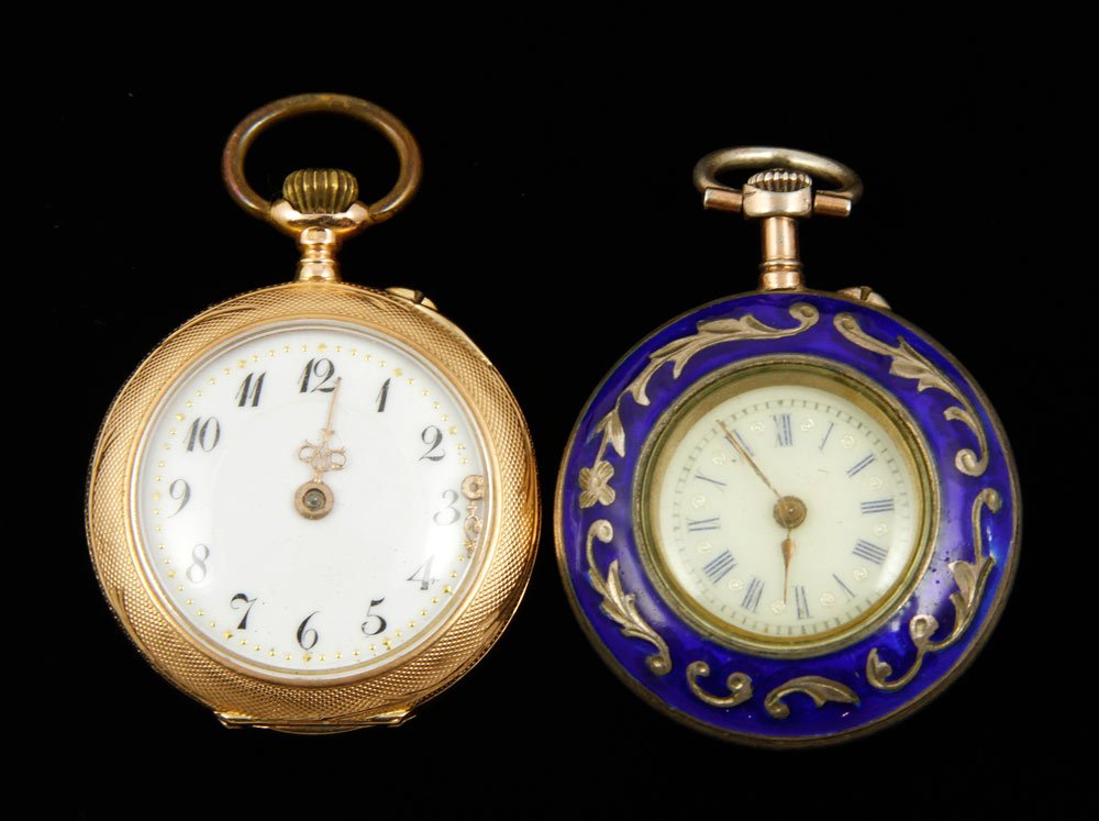 Lot of 2 Pocket Watches: Lot of two pocket watches, one 14K yellow gold, marked 585, the other enamel over silver, not hallmarked, both 1 1/8" dia, gold approximately .7 oz/ 13 DWT (including movement), silver approximately .