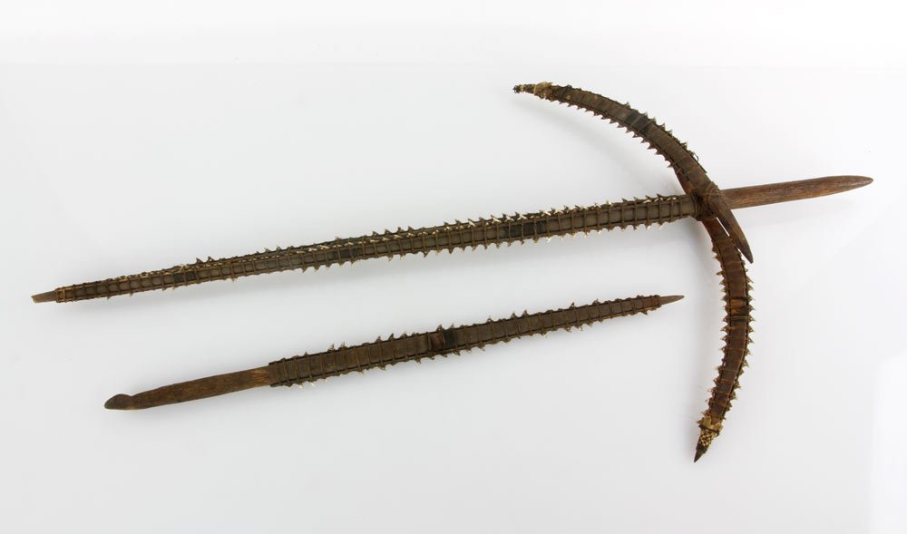 Lot of 2 Marshall's Island Weapons: Lot of two 18th or 19th century Marshall's Island shark tooth weapons. Provenance: Proceeds to benefit the Beverly Historical Society.