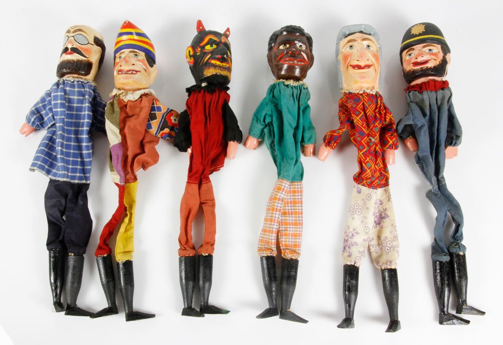 Early 20th C. French Punch and Judy Hand Puppets: Early 20th century French Punch and Judy hand puppets, consisting of six puppets, largest 17' tall. Provenance: From a Marblehead, MA estate.