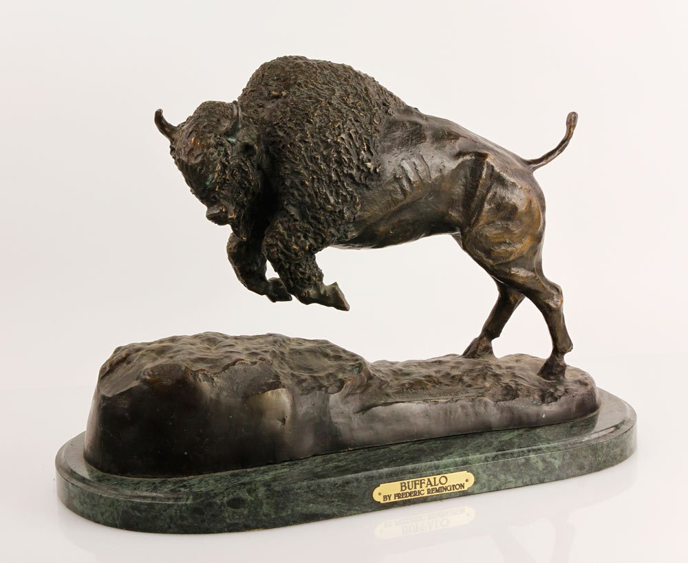 Remington Bronze: Frederic Remington bronze, 14" x 20" x 9 1/2". Provenance: CA estate.