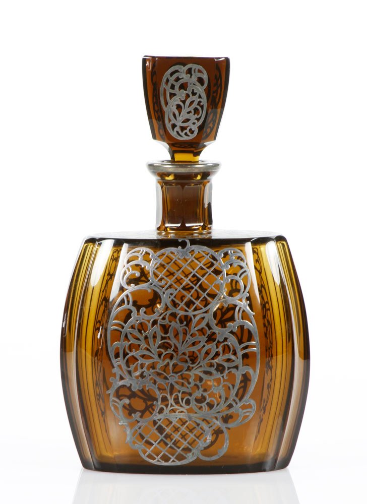 Deep Amber Blown Decanter: Deep amber, blown decanter with silver overlay, 9 1/2'' h. Provenance: Estate of Alexander Brook.