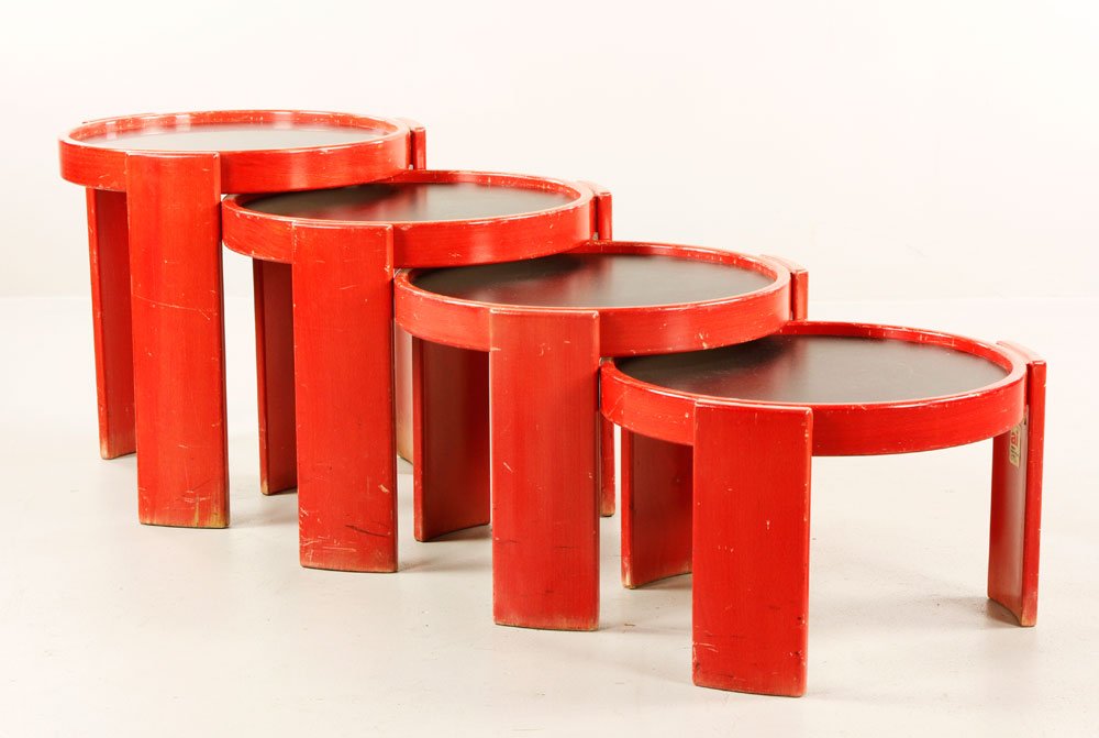 Frattini for Cassina Stacking Tables: Gianfranco Frattini (Italian, 1929-2004) for Cassina, set of four stacking tables, red lacquered beach wood with black and white Masonite reversible table tops, model 783, circa 1966, with original Ca