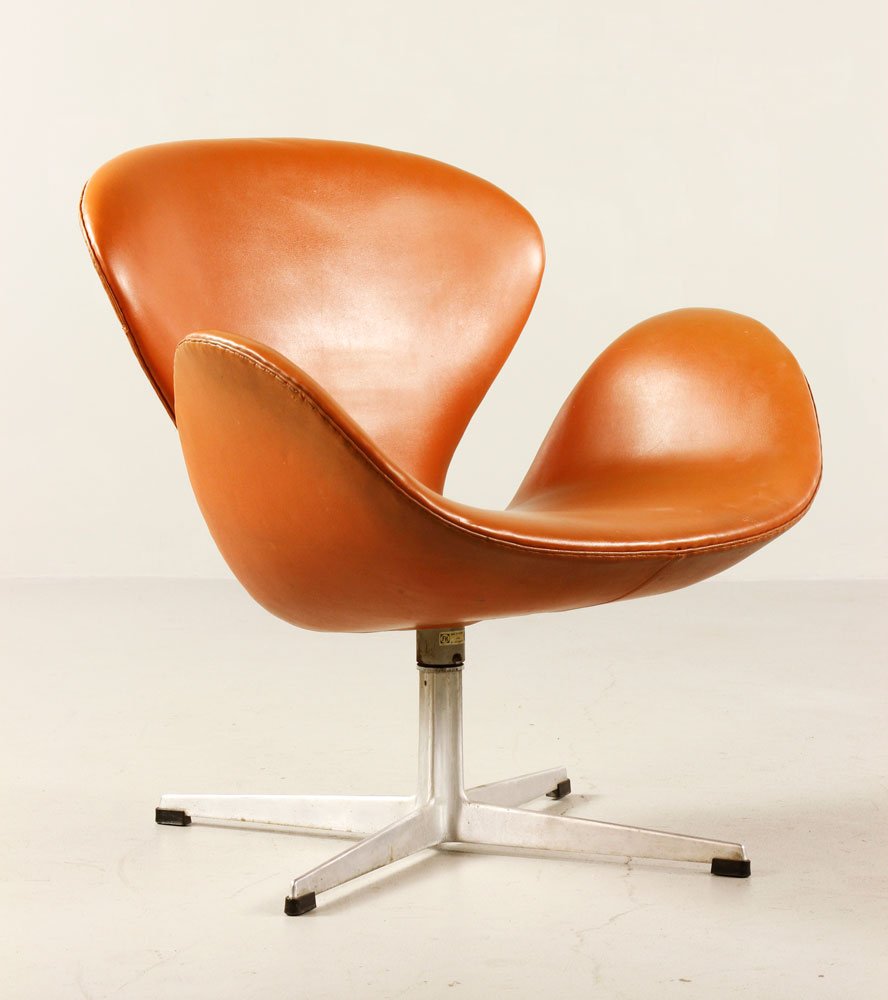 Jacobsen for Hansen Swan Chair: Arne Jacobsen for Fritz Hansen, Swan chair, vinyl upholstery, with aluminum base,and original Fritz Hansen label, circa late 1950s, 29" h x 28 1/2" w x 20" d. Provenance: From a Brookline, MA estate.