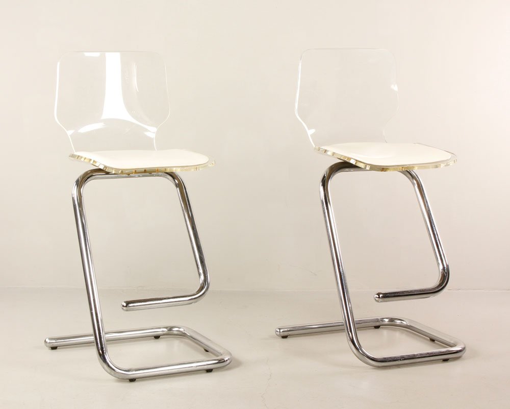 Pair of Italian Lucite Bar Stools: Pair of Italian bar stools, Lucite, with chrome frame and original naugahyde upholstery, circa mid-1960s, 41" h x 17" w x 17" w. Provenance: From a Wakefield, MA estate.
