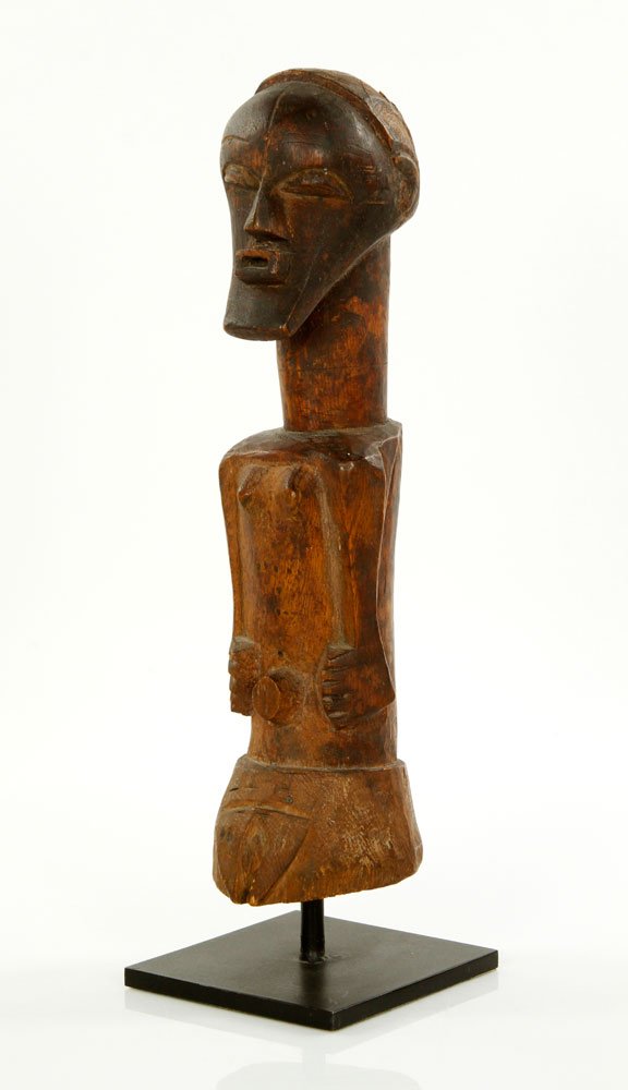 Nkishi Figure, Congo Region: In the style of the Songye complex of the Congo, possibly intended to be a Nkishi figure or power figure, carved wood, effective at protecting communities and tribes from harm, 12" h x 3 1/2" w x 3 1/