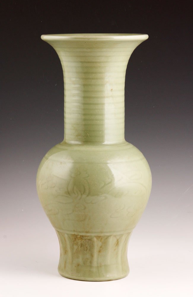 Late 16th C. Large Green Lonquan Vase: Large green Longquan ware vase, China, late 16th century, petaled base with spare incised floral decoration around body, long ridged neck and flared top, 14 1/4"h.
