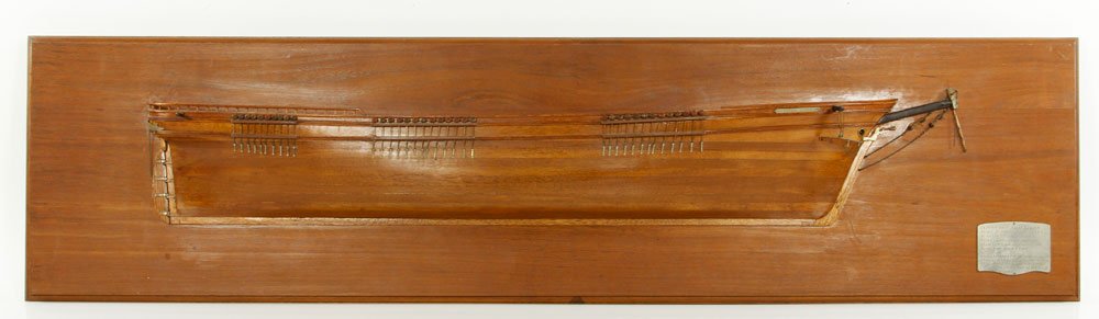 Half Hull Ship Model: Half hull model of Flying Cloud with figurehead, made by John Corliss of Cape Ann, Massachusetts, model 31"l, plaque 41"l. Provenance: From a Beverly, MA estate.