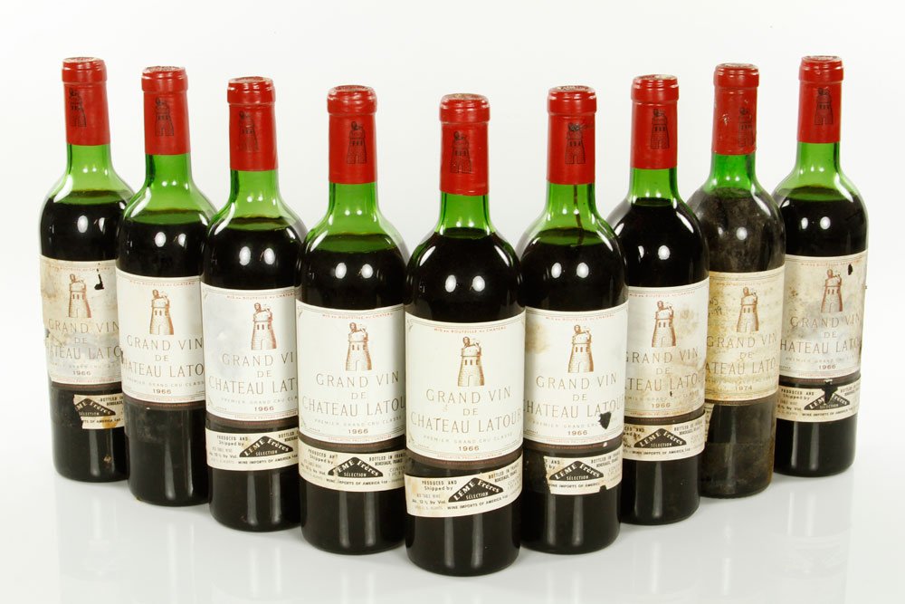 9 Bottles Chateau Latour: Nine bottles of Chateau Latour wine, eight bottles 1966, one bottle 1974. Provenance: From a Beacon Hill collector. Note: all wine must be picked up at 117 Elliott Street, Beverly, MA and cannot be sh