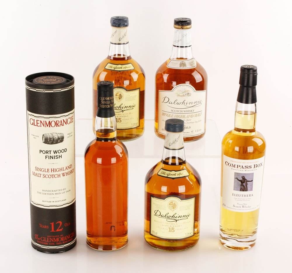 5 Bottles Single Malt Scotch Whiskey: Five bottles of single malt scotch whiskey, including three 1-liter bottles of Dalwhinne 15 Year, one bottle Compass Box Eleuthera, one bottle Glenmorangie Port Wood Finish. Provenance: From a Beacon 