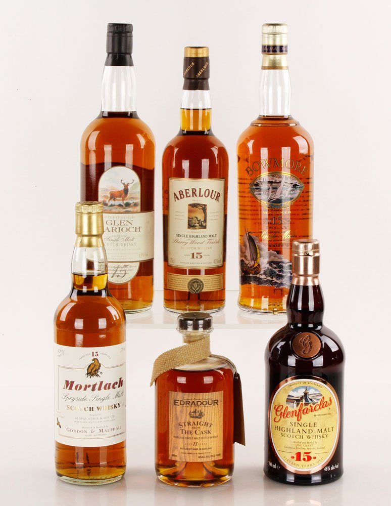 6 Bottles Single Malt Scotch Whiskey: Six bottles of single malt whiskey, including one 700 ML Glenfarclas 15 Year, one 500 ML Edradour 11 Year "Straight from the Cask" Boxed, one 1 liter Glen Garioch Highland 15 Year, one Bowmore Mariner