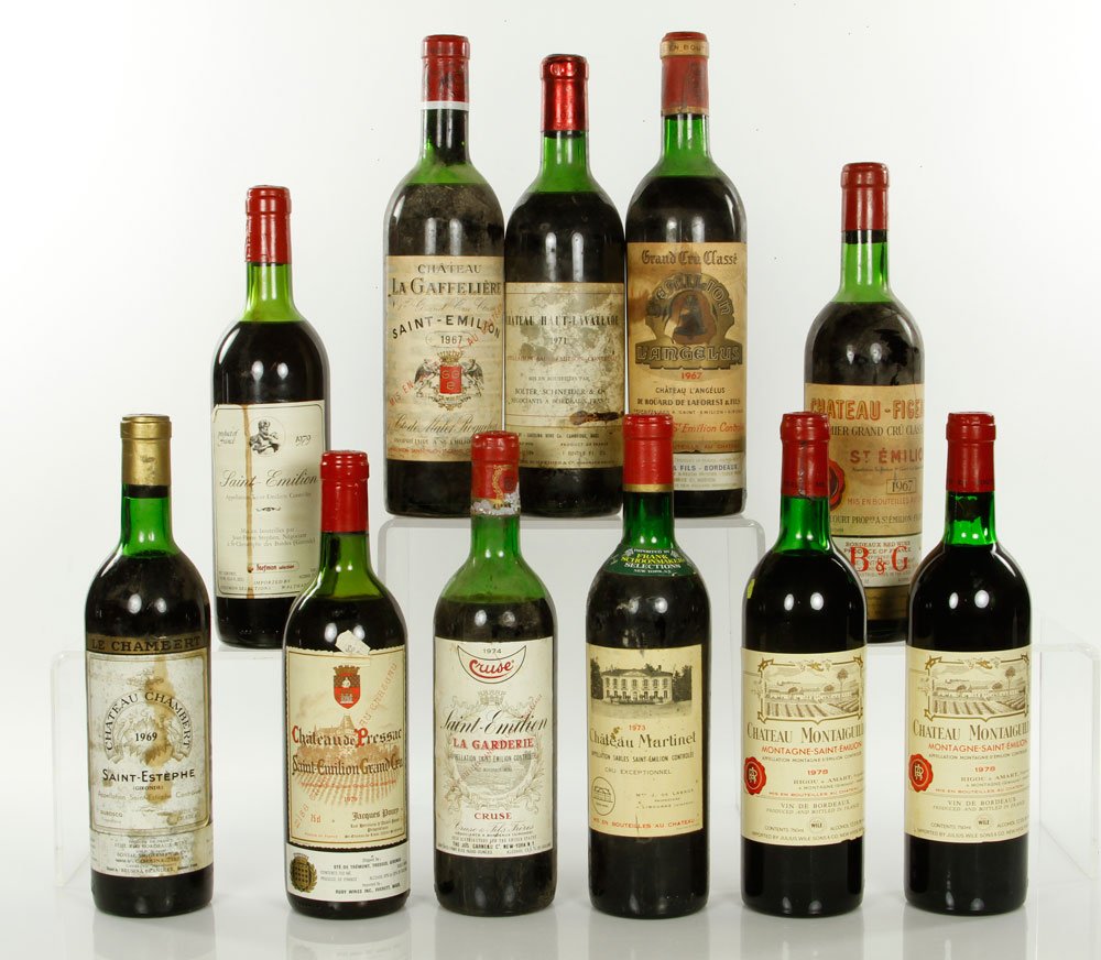 11 Assorted Saint-Emillion Wines: Eleven bottles of Saint-Emilion from various vineyards and vintages, 1967-1976, France. Provenance: From a Beacon Hill collector. Note: all wine must be picked up at 117 Elliott Street, Beverly, MA an