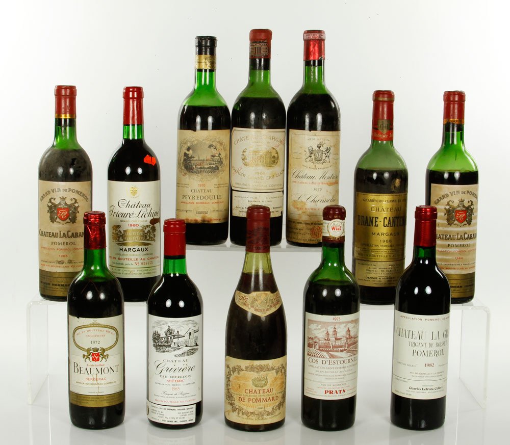 12 Assorted French Wines: Twelve bottles of assorted wine, including three 1996 Pommerol, one 1967 Pommerol, one 1973 Cos d'Estournel, one 1959 Chateau Montrose, one 1985 Medoc, one 1970 Chateau Peyredoulle, one 1966 Chateau B