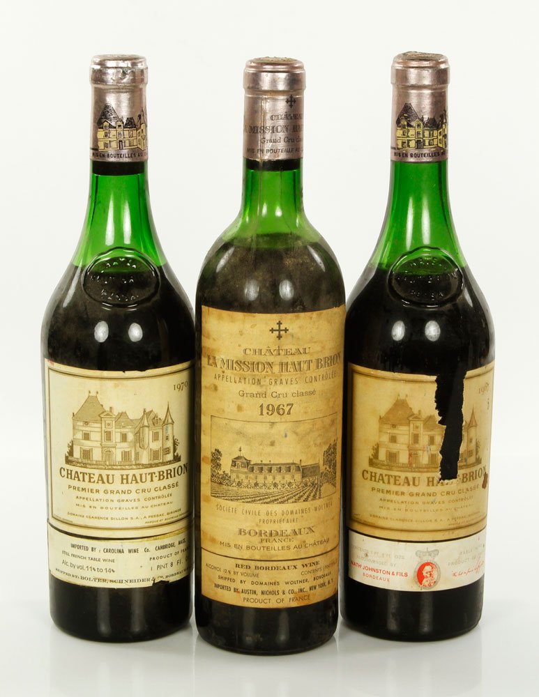 3 Bottles Bordeaux: Three bottles of Bordeaux wine, including a 1970 Chateau Haut-Brion, a 1967 Chateau La Mission Haut-Brion, and a 1967 Chateau Haut-Brion, French. Provenance: From a Beacon Hill collector. Note: all wi