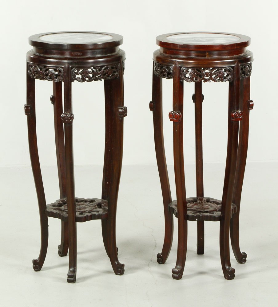 Two Chinese Stands: Two carved hardwood stands, China, with marble tops, 32"h.