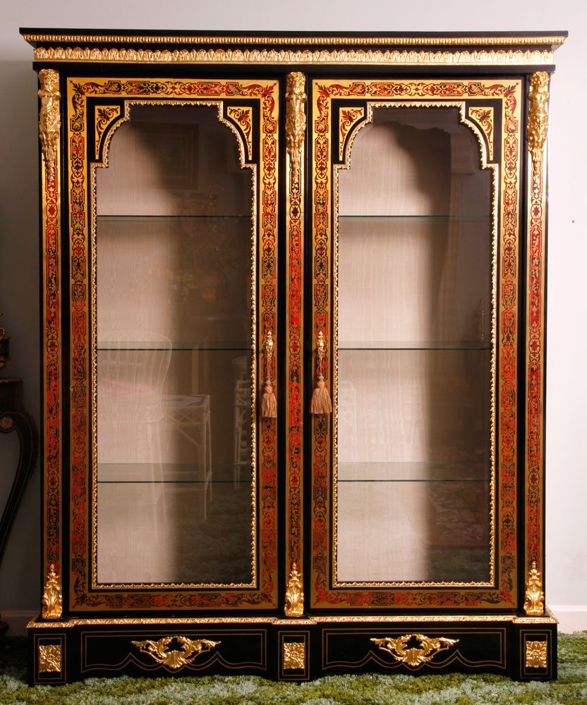 Napoleon III Boulle Wall Cabinet: Napoleon III boulle wall cabinet, ebonized wood, with long glass doors, with keys, with cast mounts or torsos and heads, 82" h x 68" w. Provenance: From the estate of the late Raymond Bolduc of Fort L