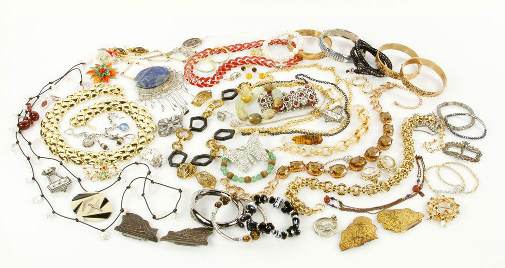 Lot of Costume Jewelry: Lot of silver and gold fill costume jewelry, of various ages to include: Trifari, Victorian rhinestone, mourning, lorgnette, lapis, etc., three pairs of earring with gold findings, approximately 5.8 t