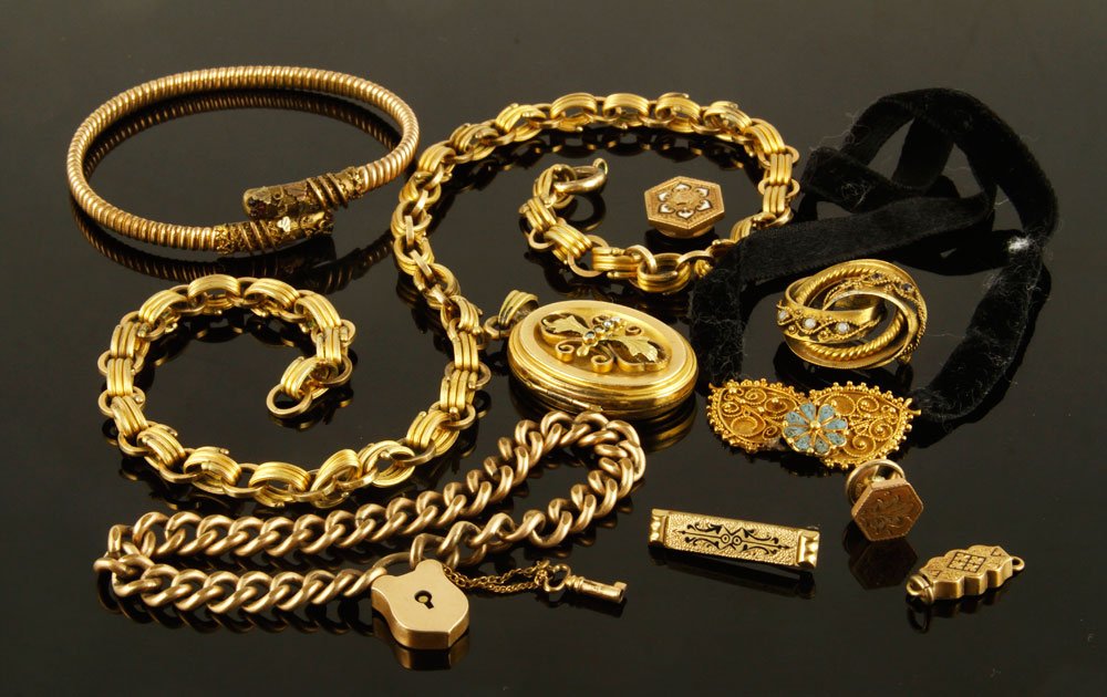 Lot of Victorian Jewelry: Lot of Victorian jewelry, gold filled, to include: watch fobs, locket, and pins, ten pieces total. Provenance: From a Billerica, MA estate.