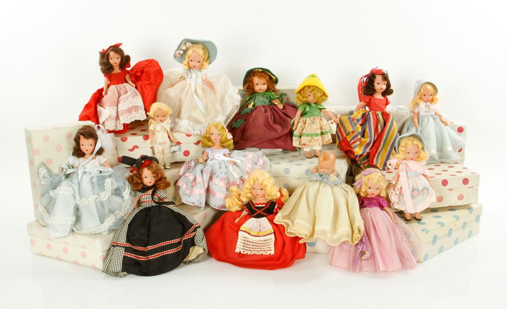 Lot of 14 Nancy Ann Dolls: Lot of fourteen Nancy Ann dolls, to include: Storybook dolls Autumn 92, Goosegirl 169, Summer 91, Fairyland Curly Locks 154, When She Was Good 32, February Fairy Girl 188, Sweet October Maiden 196, Hu